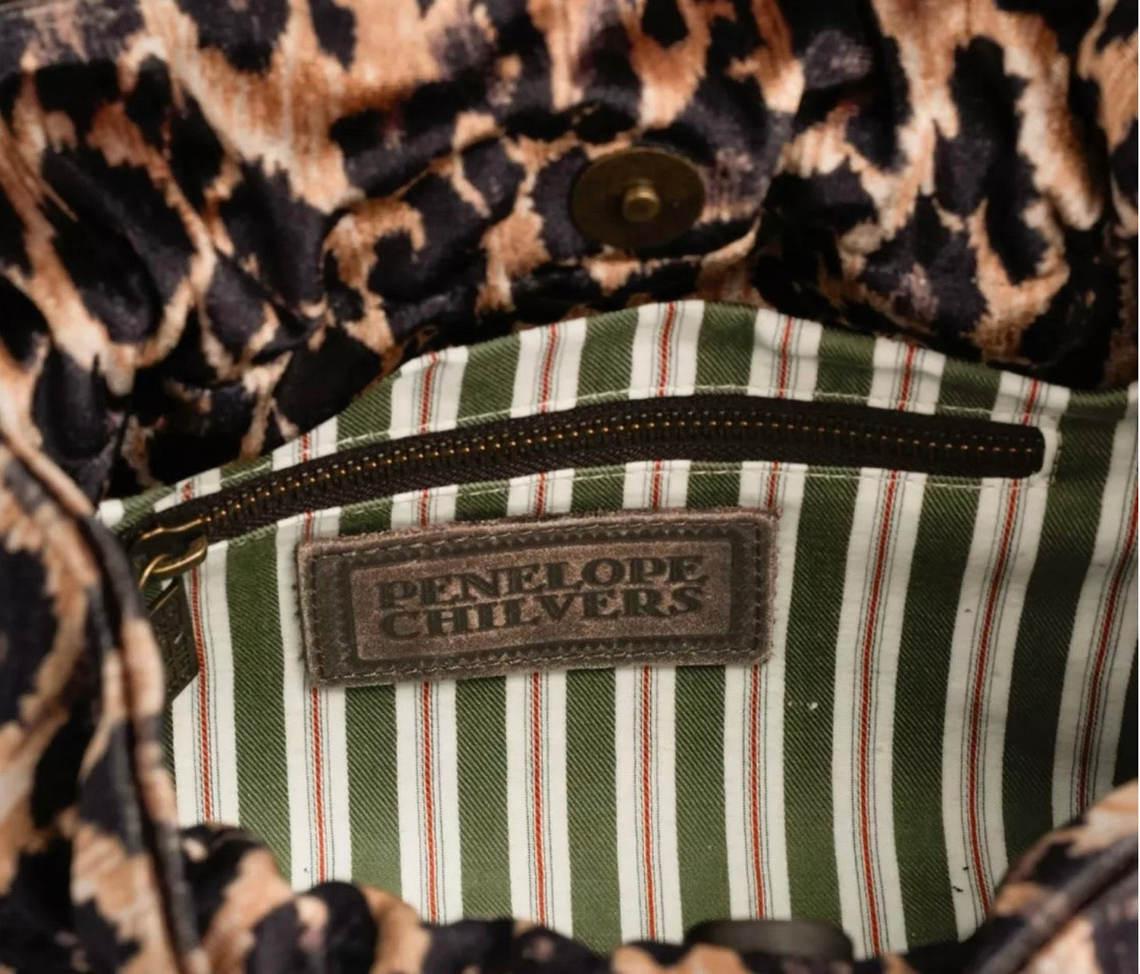 Penelope Chilvers Puffball leopard clutch